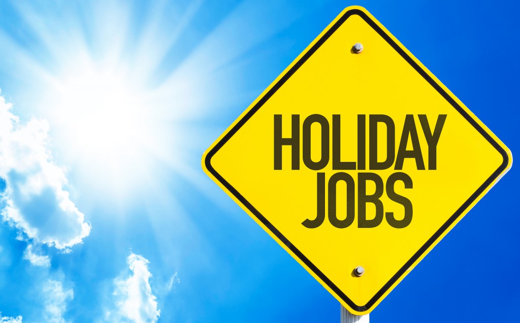 Holiday Jobs sign with sky background Recruiteze