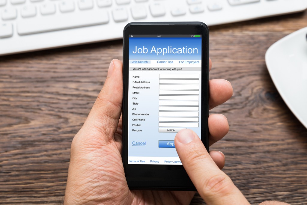 Person Hands Filling Job Application On Mobile Phone Recruiteze